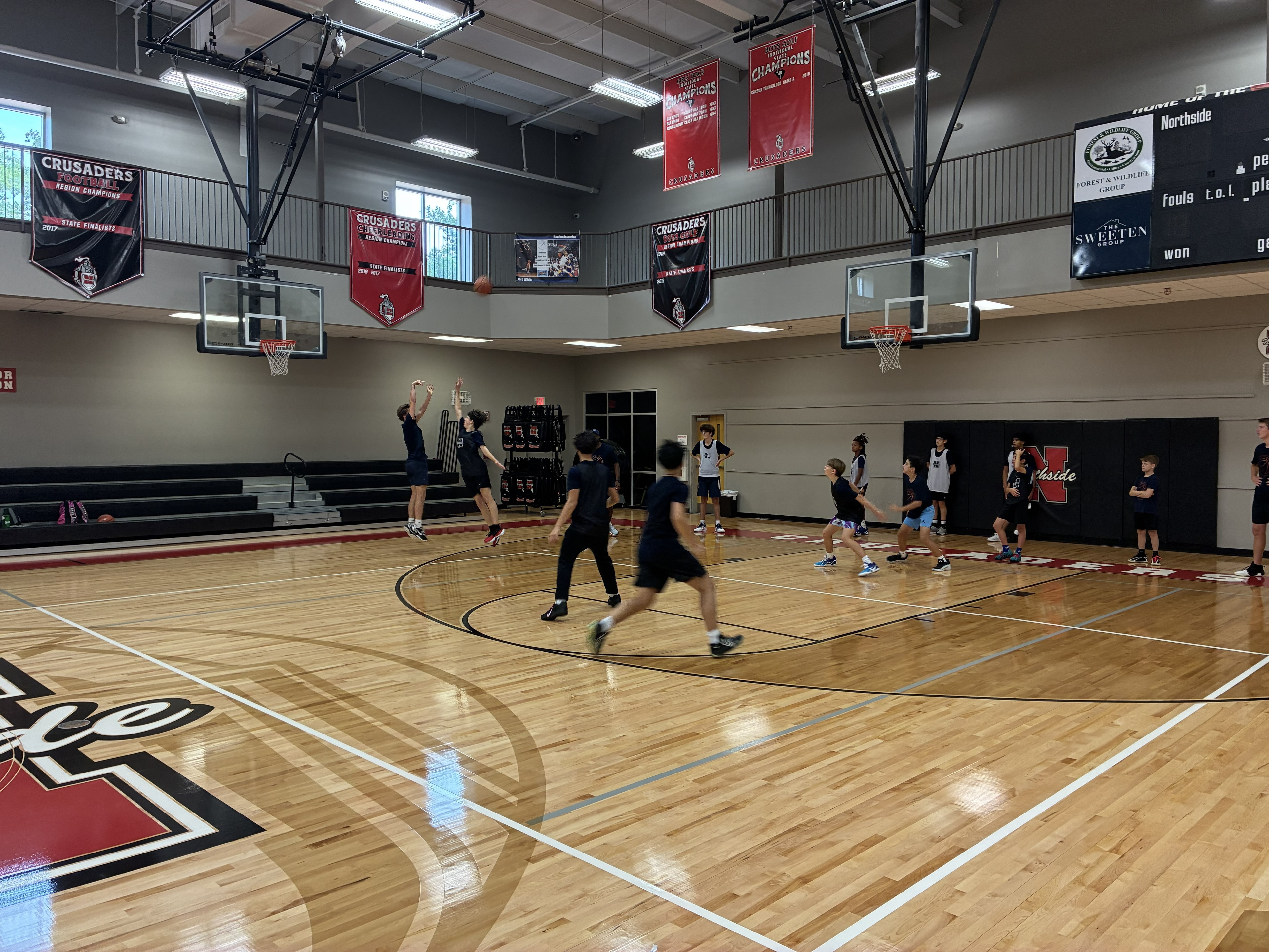 Youth players shooting during a CBA4Youth session