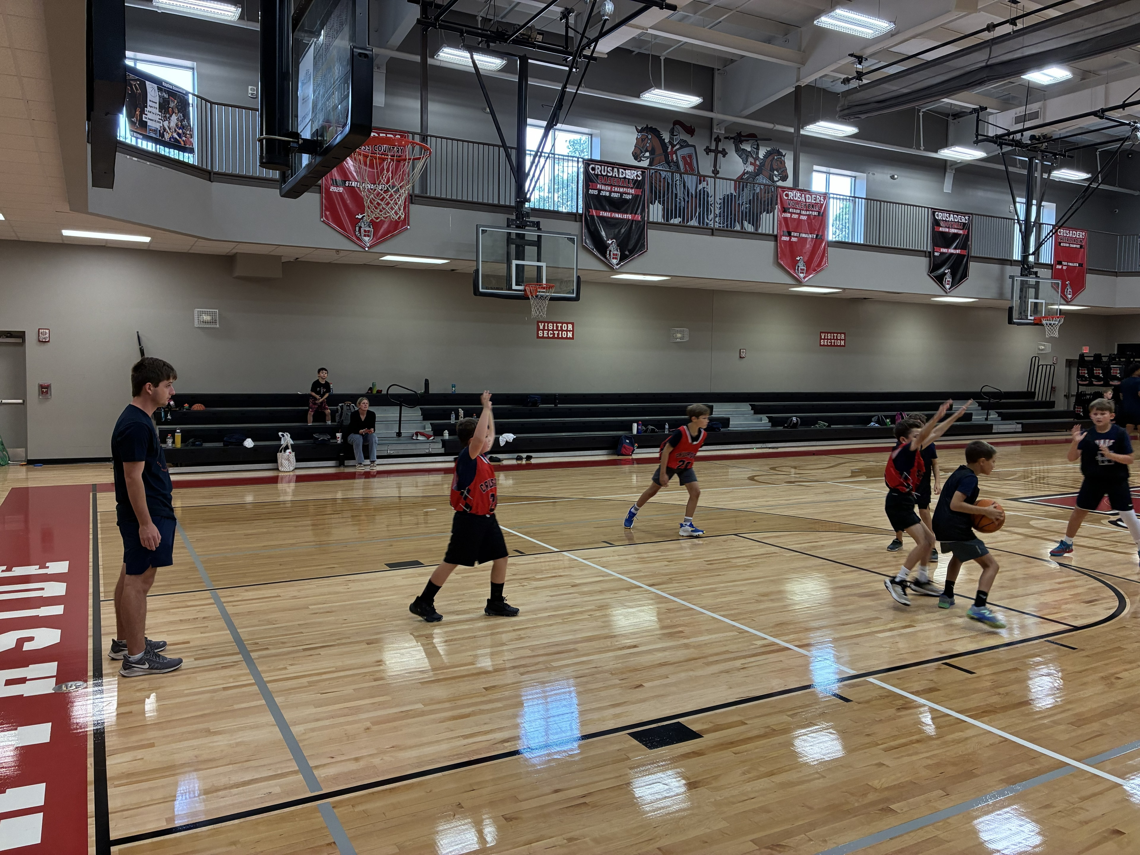 Youth basketball camp session at Northside gymnasium