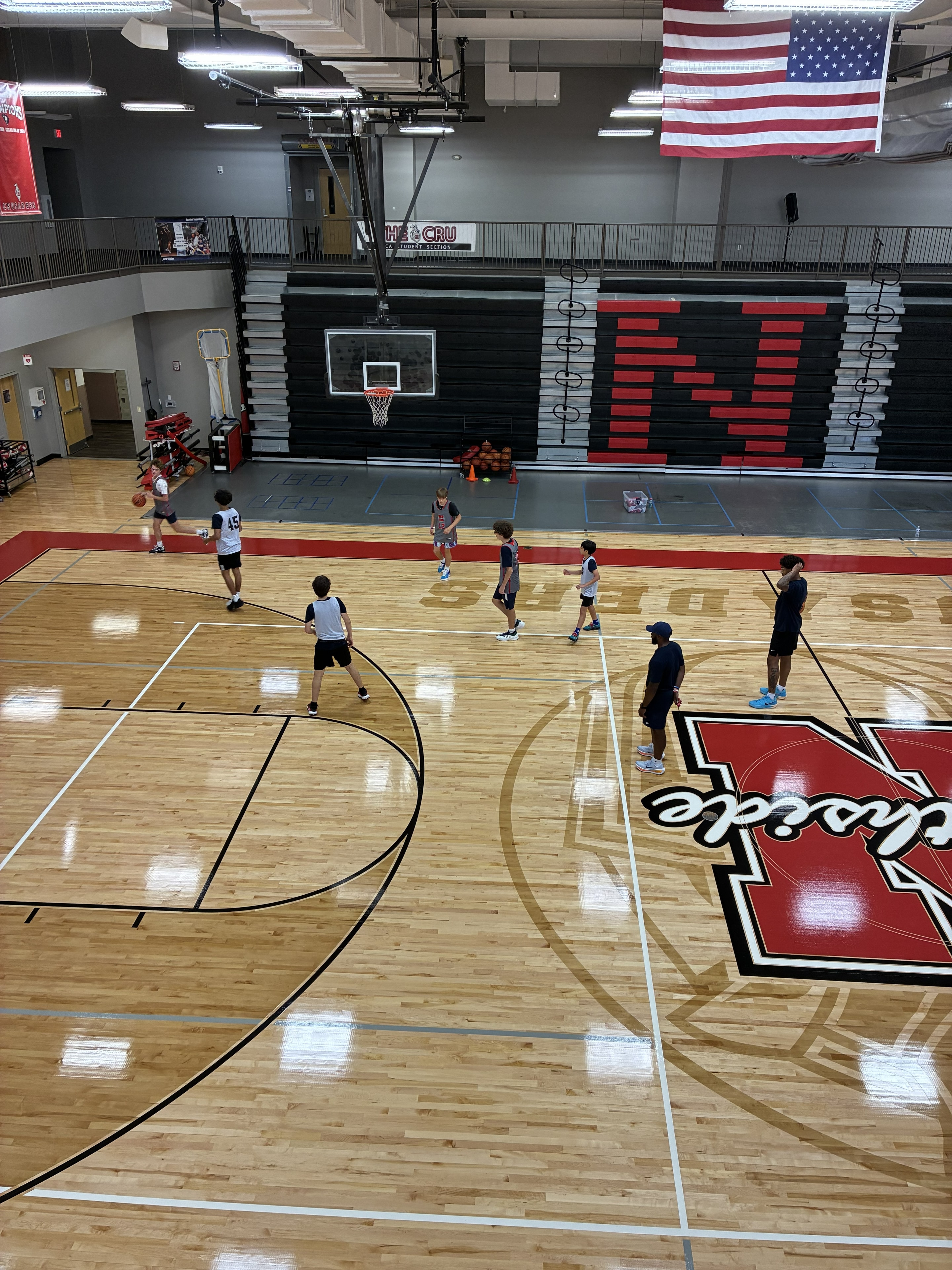 Youth basketball players practicing on the Northside court