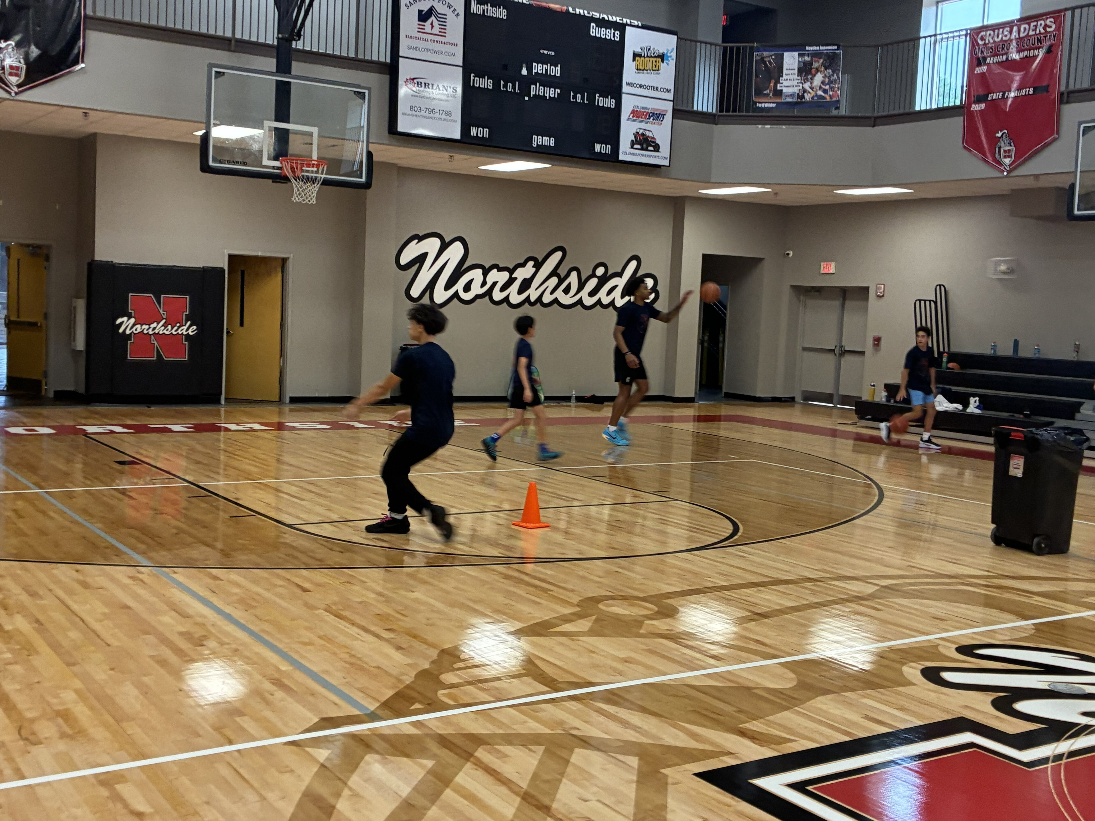 Basketball players participating in a CBA4Youth camp